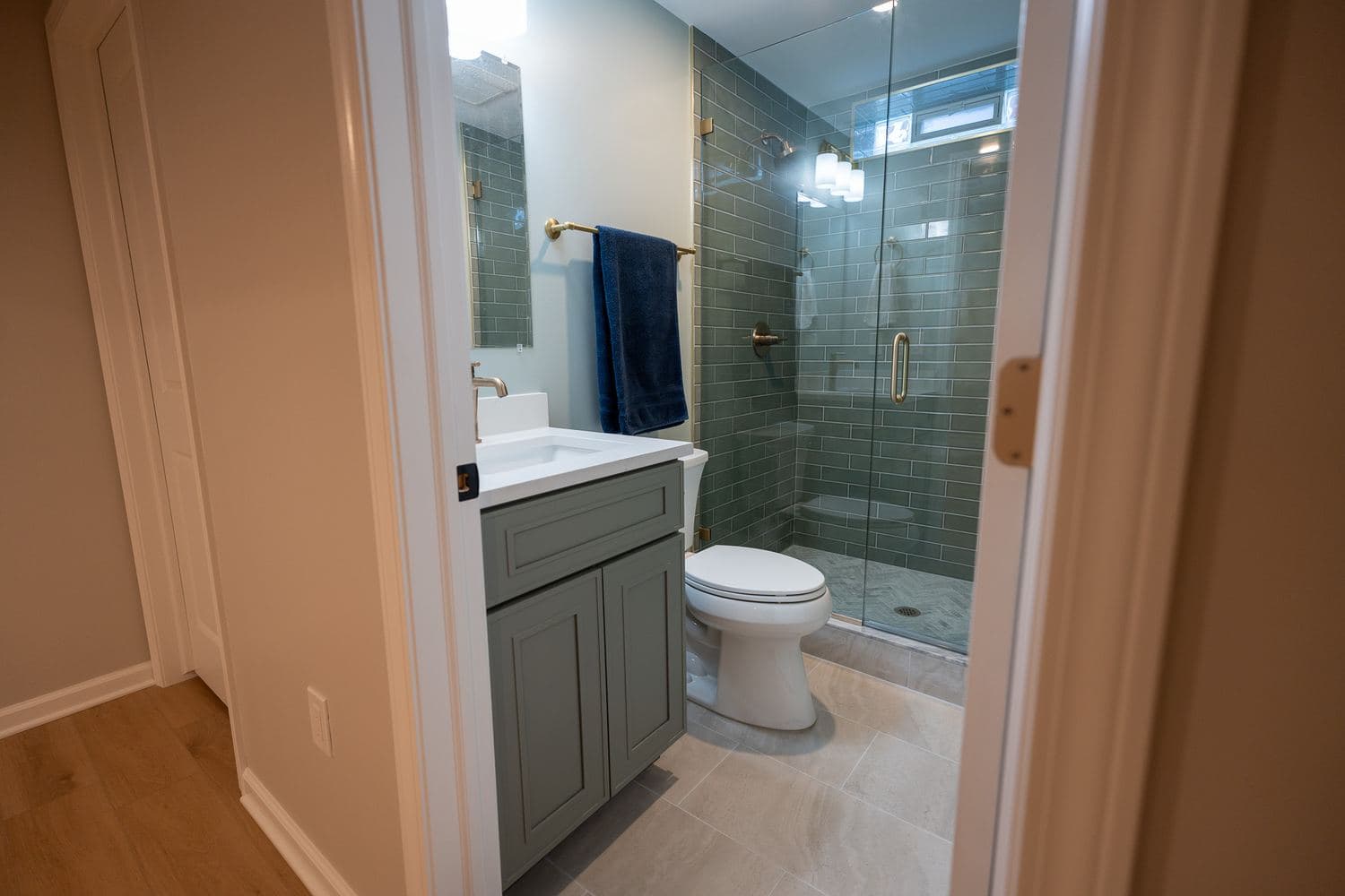 Bathroom with a soaking tub and tile surround
