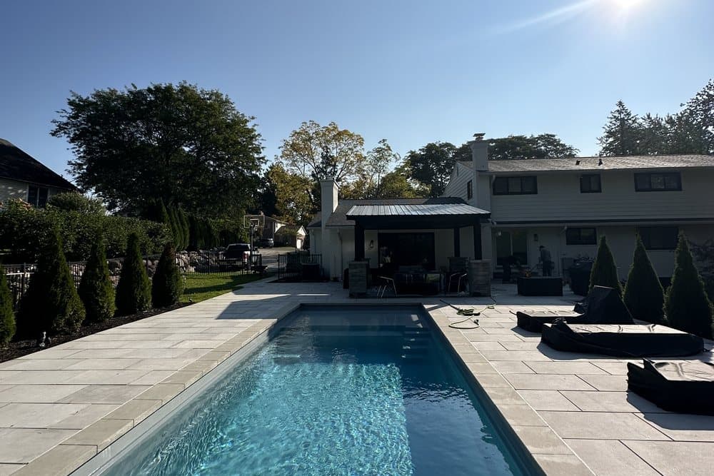 Pool with a covered outdoor living area