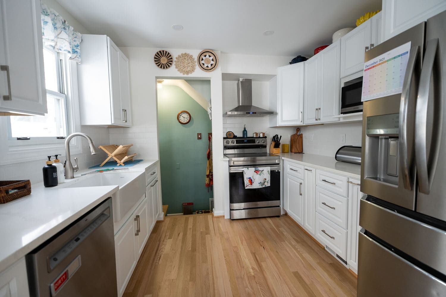 Kitchen with stone counters and stainless appliances